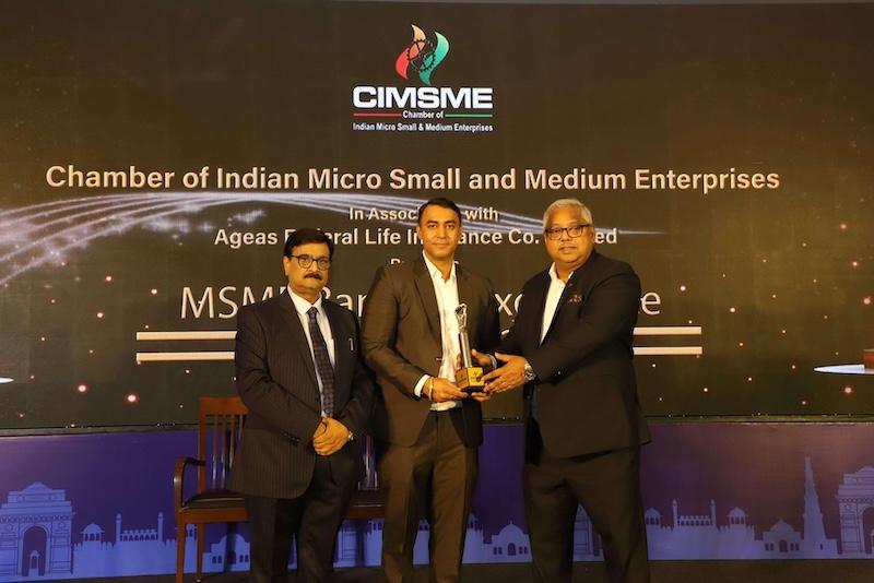 A Moment of Recognition: Khushal Chopra Receives the Award